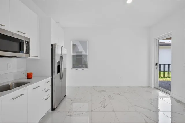 an empty room with closet area