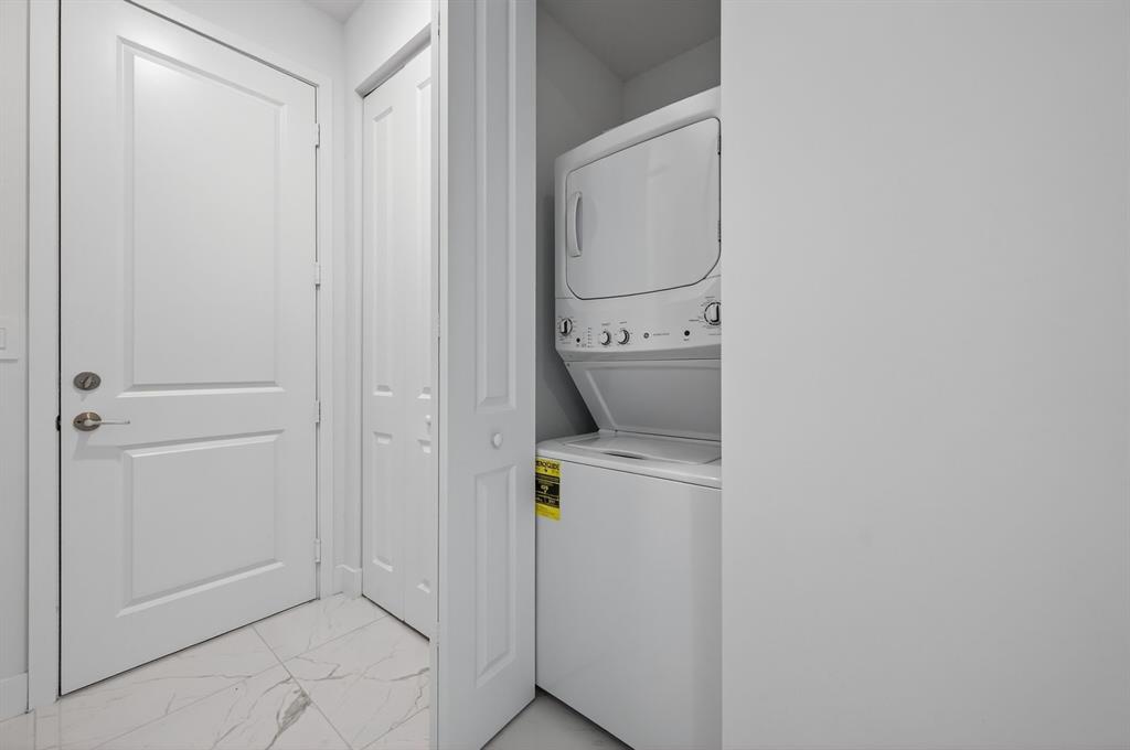 4421 Southwest 123rd Avenue Davie, FL 33330 - Photo 25 of 62 a utility room with dryer and washer