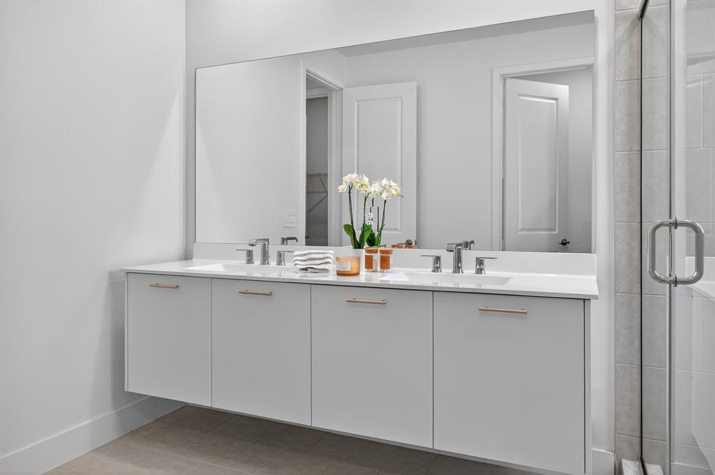 4421 Southwest 123rd Avenue Davie, FL 33330 - Photo 36 of 62 a bathroom with a double vanity sink and a mirror