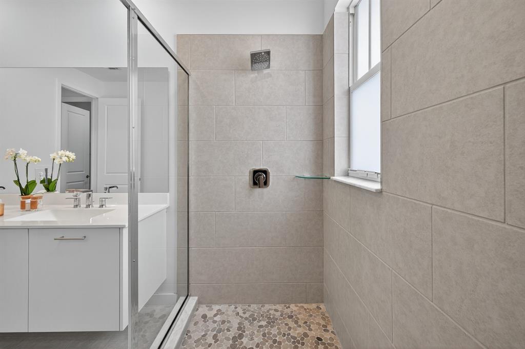 4421 Southwest 123rd Avenue Davie, FL 33330 - Photo 37 of 62 a bathroom with a sink a toilet and shower