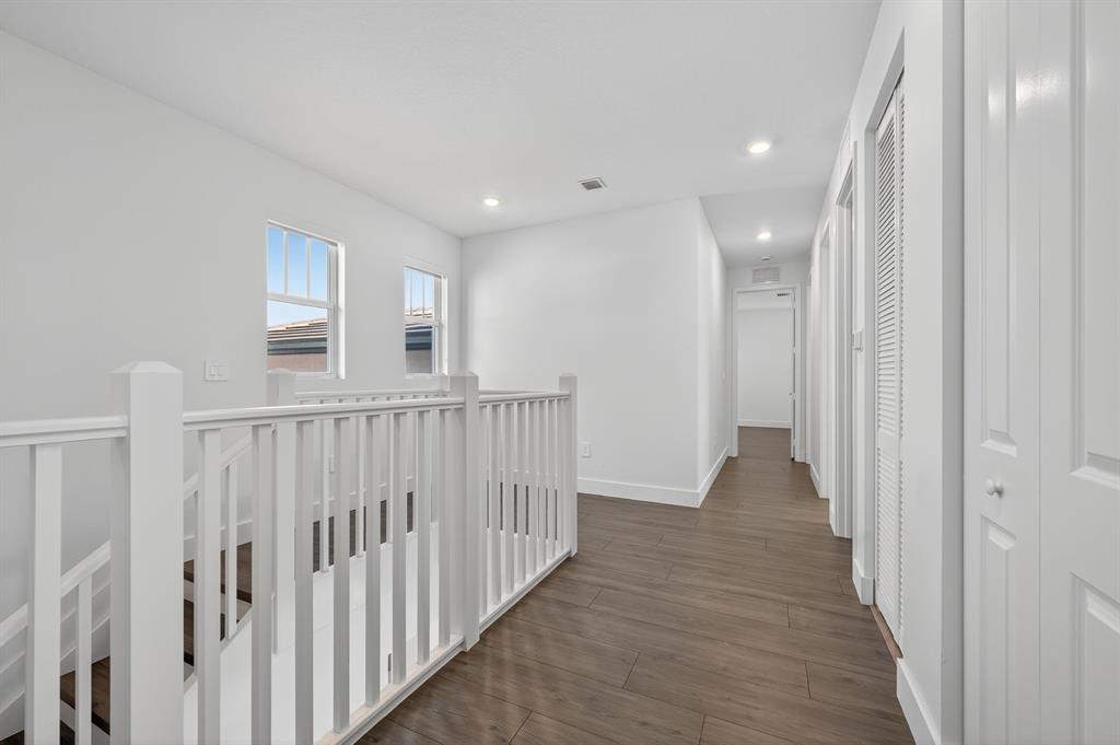 4421 Southwest 123rd Avenue Davie, FL 33330 - Photo 41 of 62 a view of a hallway with wooden floor