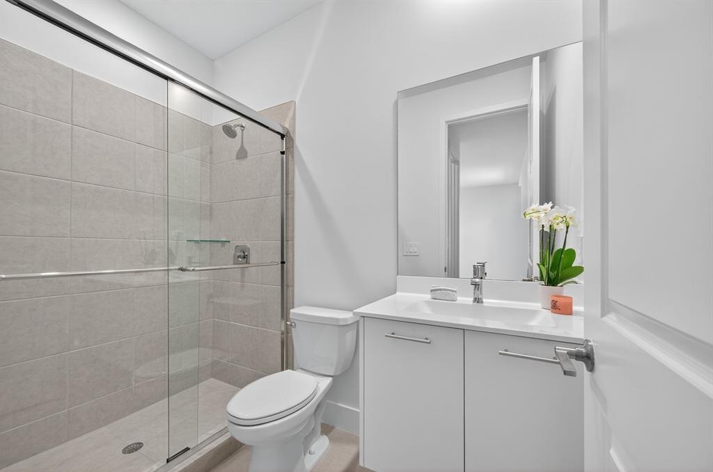 4421 Southwest 123rd Avenue Davie, FL 33330 - Photo 47 of 62 a bathroom with a sink toilet and shower