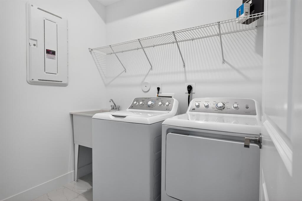 4421 Southwest 123rd Avenue Davie, FL 33330 - Photo 48 of 62 a utility room with dryer and washer