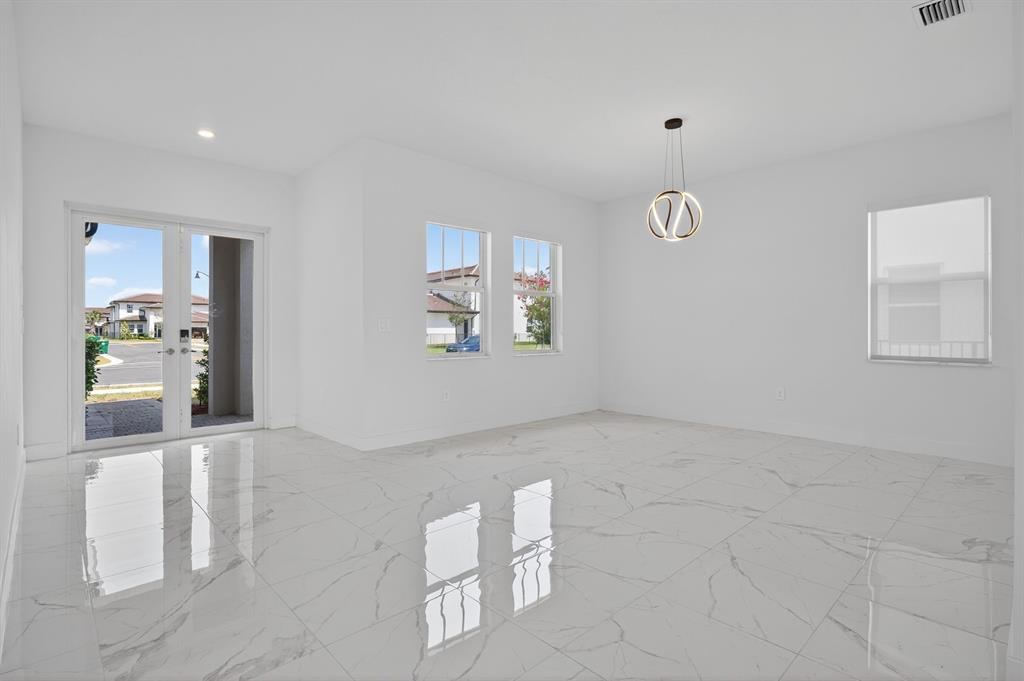 4421 Southwest 123rd Avenue Davie, FL 33330 - Photo 5 of 62 a view of an empty room with a window