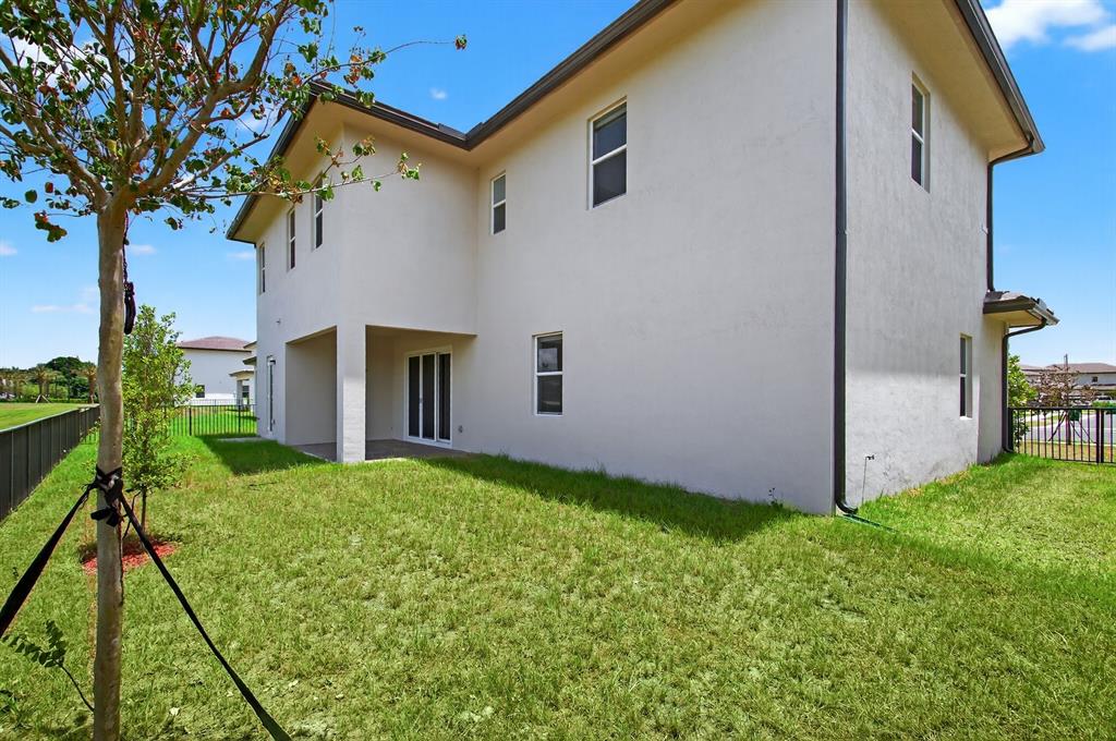 4421 Southwest 123rd Avenue Davie, FL 33330 - Photo 60 of 62 a view of a house with a yard