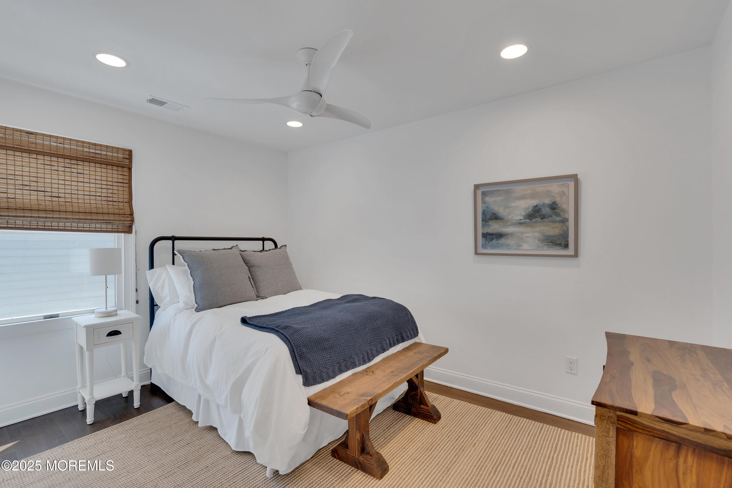 57 W River Road Rumson, NJ 07760 - Photo 21 of 44 a bedroom with a bed and a desk