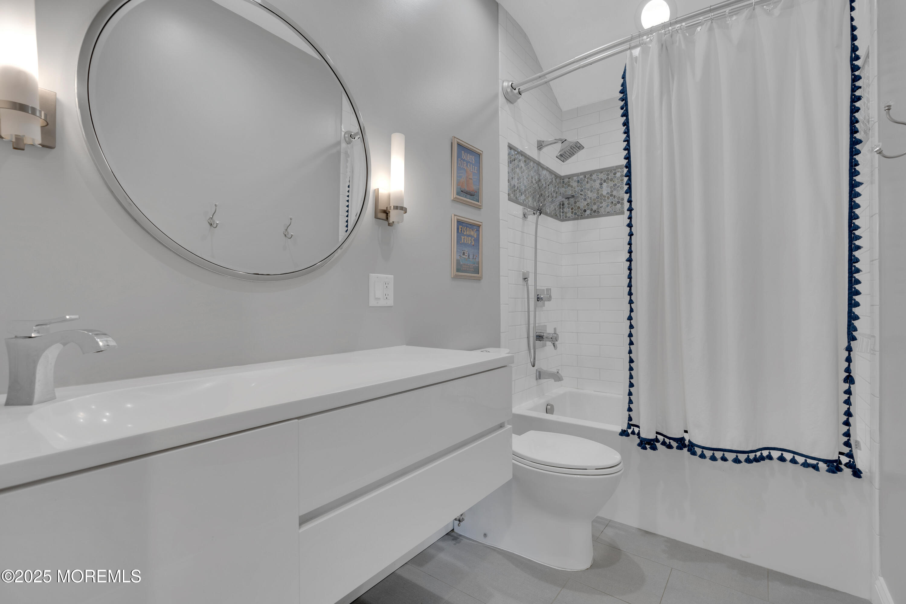 57 W River Road Rumson, NJ 07760 - Photo 25 of 44 a bathroom with a granite countertop sink a toilet and shower