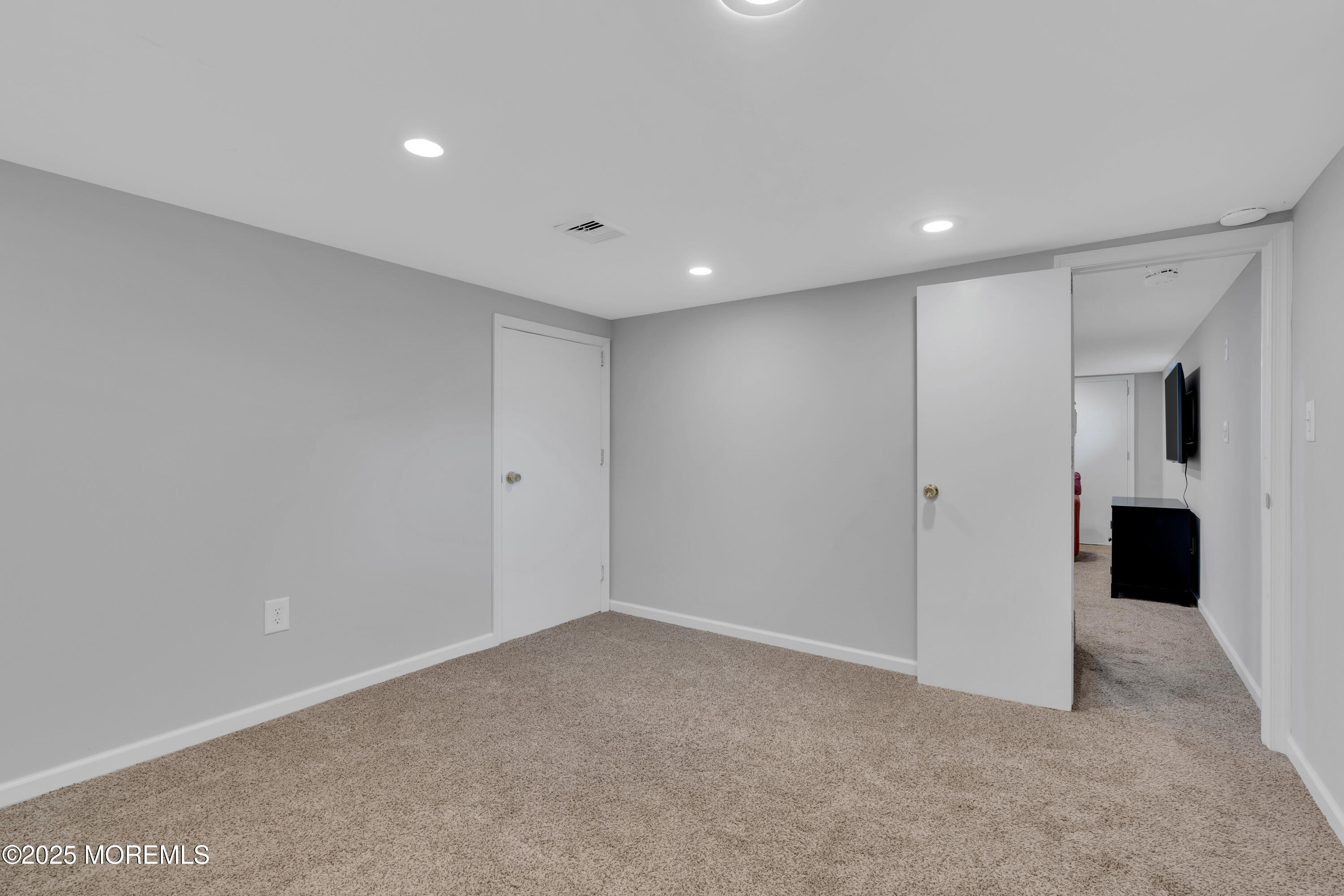 57 W River Road Rumson, NJ 07760 - Photo 28 of 44 a view of a big room with wooden cabinet and windows