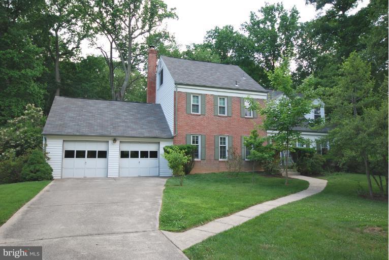 13628 Middlevale Lane Silver Spring, MD 20906 - Photo 13 of 25 front view of a house with a yard