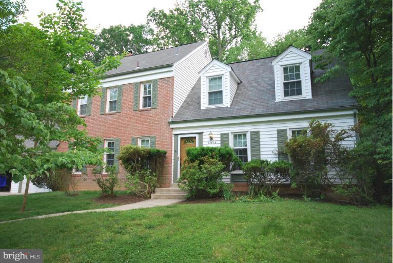 13628 Middlevale Lane Silver Spring, MD 20906 - Photo 6 of 25 a front view of a house with a garden