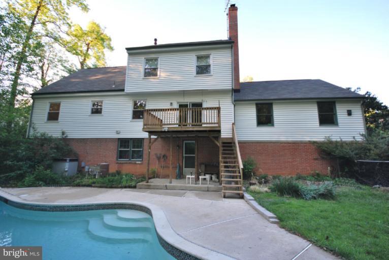 13628 Middlevale Lane Silver Spring, MD 20906 - Photo 7 of 25 a front view of a house with garden