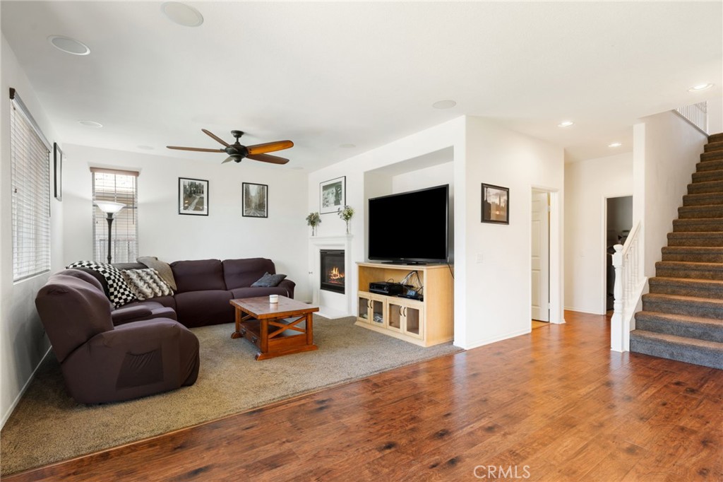 46545 Peach Tree Street Temecula, CA 92592 - Photo 13 of 48 a living room with furniture and a flat screen tv