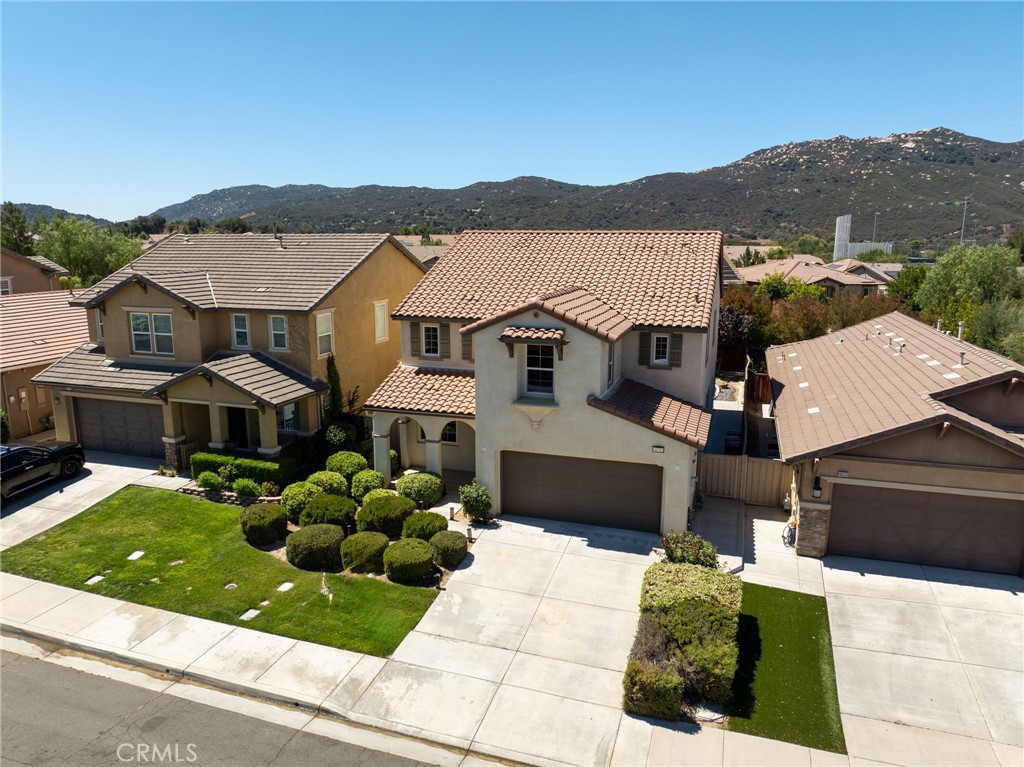 46545 Peach Tree Street Temecula, CA 92592 - Photo 2 of 48 an aerial view of a house with a garden
