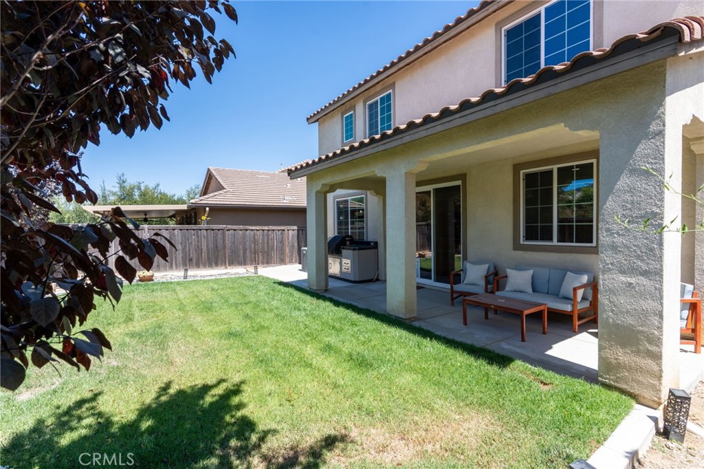 46545 Peach Tree Street Temecula, CA 92592 - Photo 32 of 48 a view of a house with backyard and porch