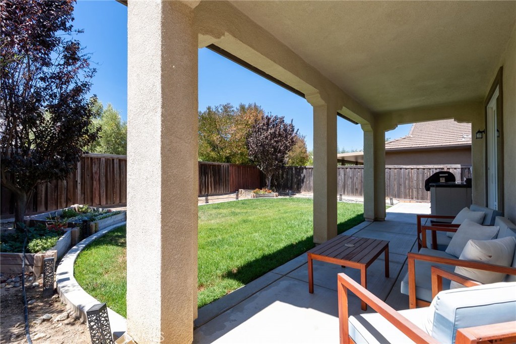 46545 Peach Tree Street Temecula, CA 92592 - Photo 33 of 48 a view of backyard with outdoor seating and green space