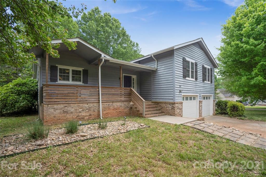 167 Mooreland Road, Unit 94 Mooresville, NC 28117 - Photo 2 of 34 front view of a house with a yard