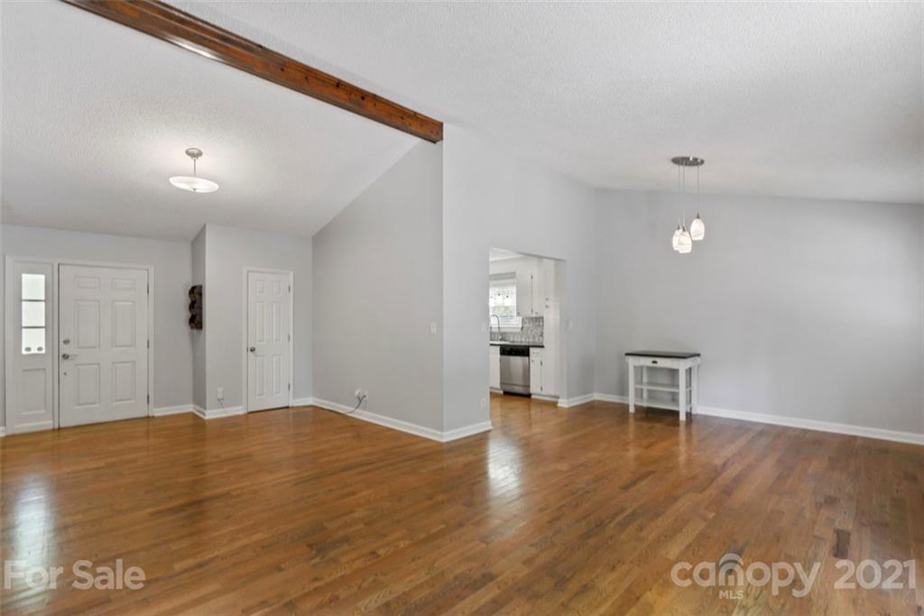 167 Mooreland Road, Unit 94 Mooresville, NC 28117 - Photo 3 of 34 a view of empty room with wooden floor