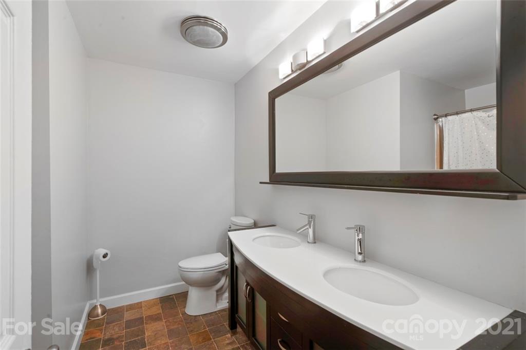 167 Mooreland Road, Unit 94 Mooresville, NC 28117 - Photo 22 of 34 a bathroom with a sink and a mirror