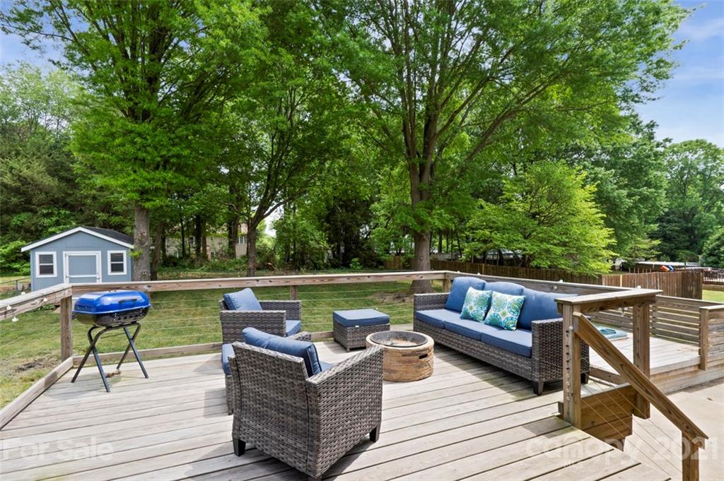 167 Mooreland Road, Unit 94 Mooresville, NC 28117 - Photo 29 of 34 a view of house with patio outdoor seating and green space