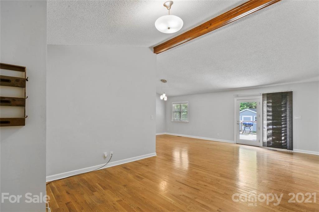 167 Mooreland Road, Unit 94 Mooresville, NC 28117 - Photo 5 of 34 a view of empty room with wooden floor