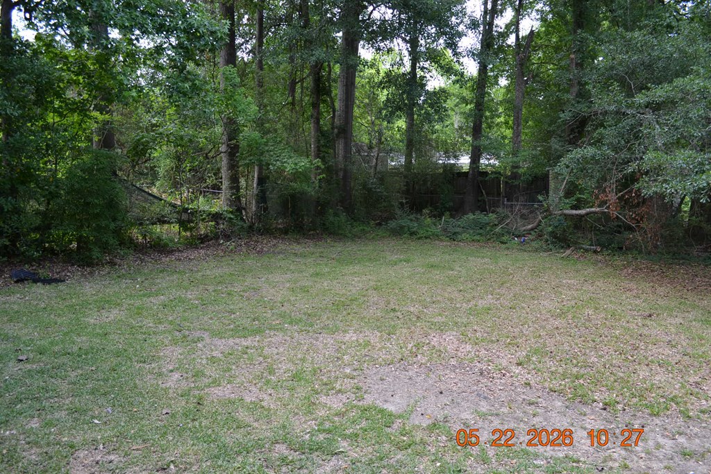 5552 Valleybrook Road Columbus, GA 31907 - Photo 21 of 27 a view of a field with trees in the background