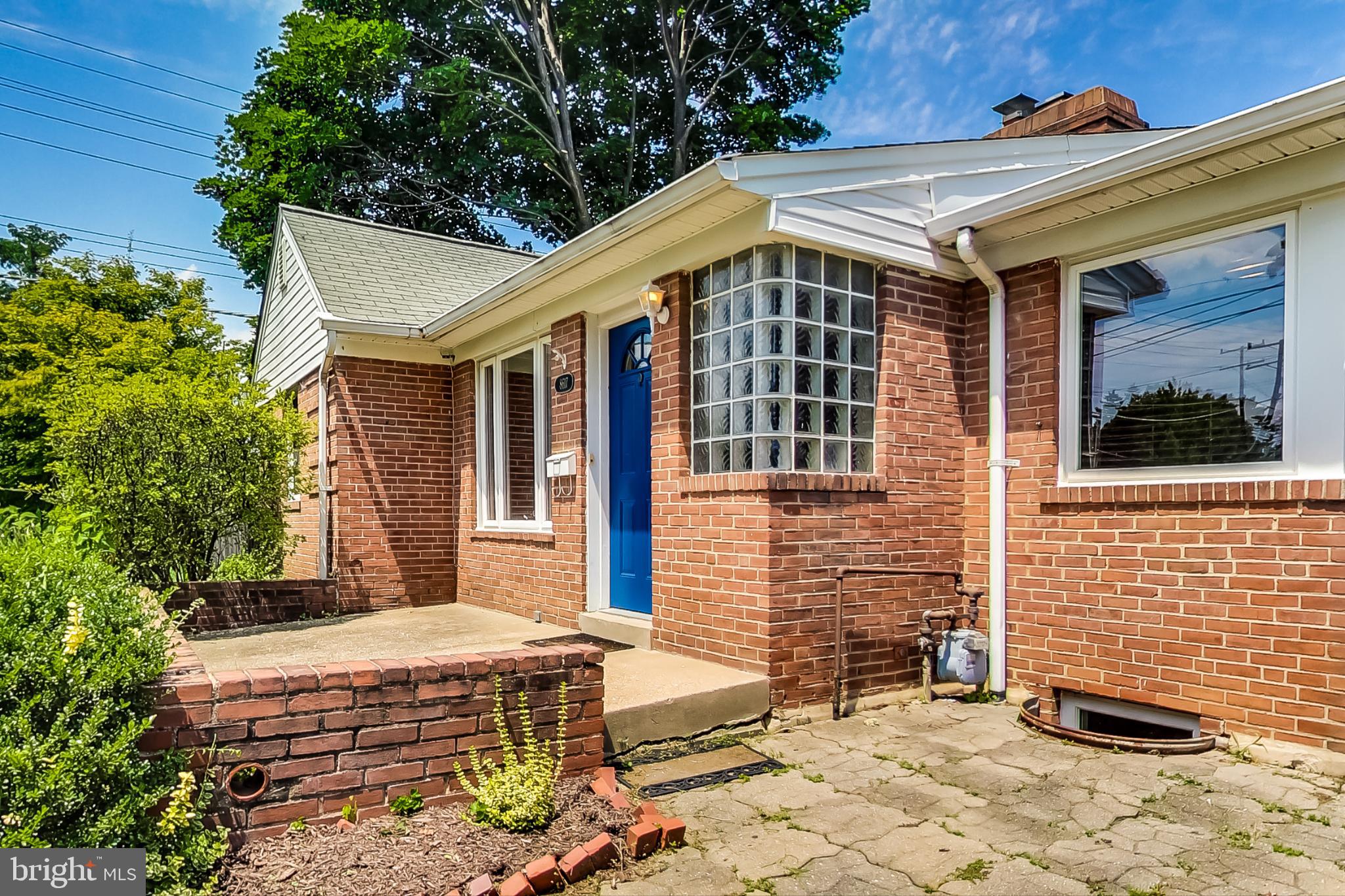 8617 Lynbrook Drive Bethesda, MD 20814 - Photo 13 of 48 a front view of a house with parking