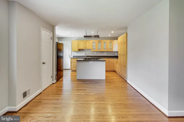 a view of a kitchen with a sink and dishwasher