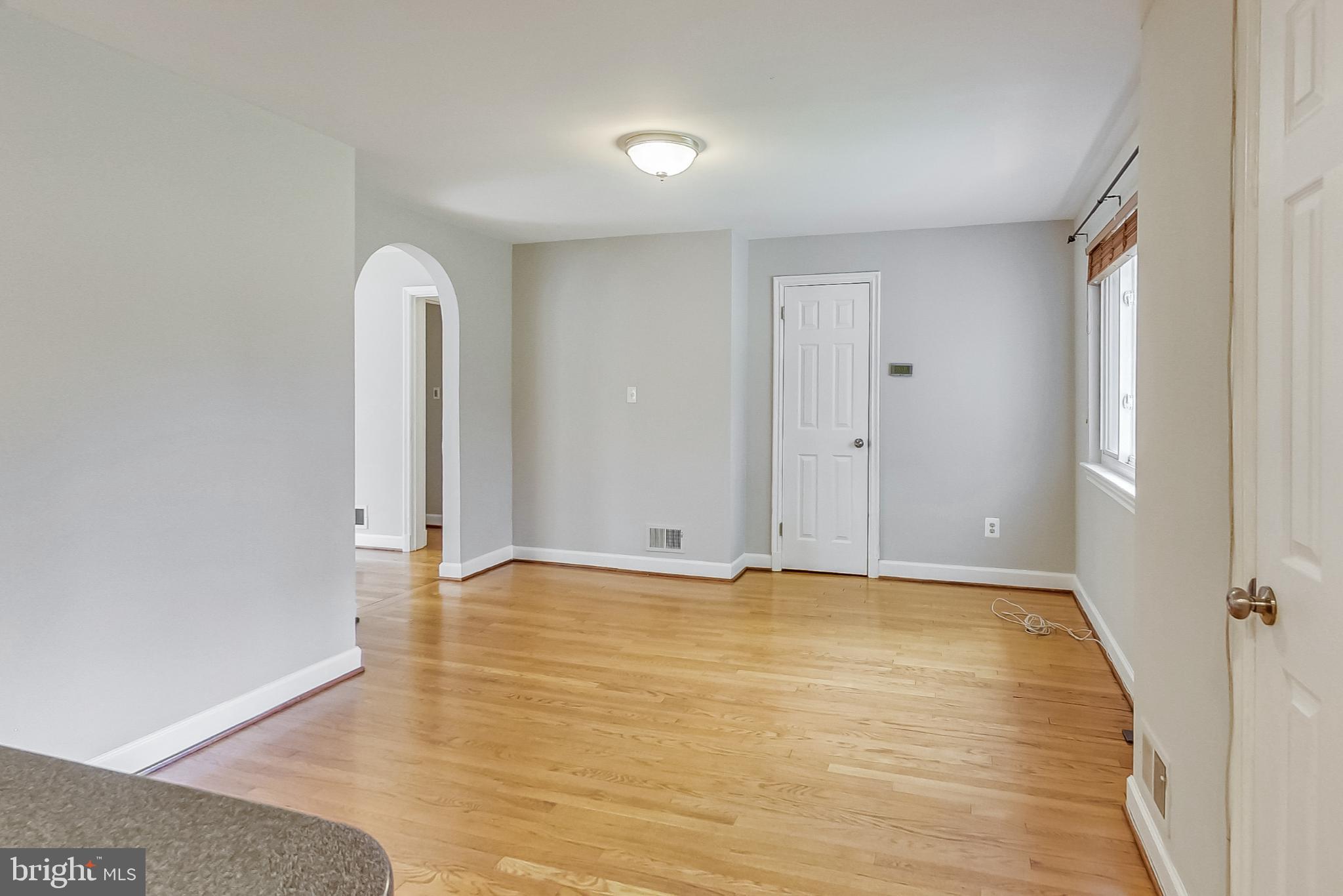 8617 Lynbrook Drive Bethesda, MD 20814 - Photo 18 of 48 a view of an empty room with glass door