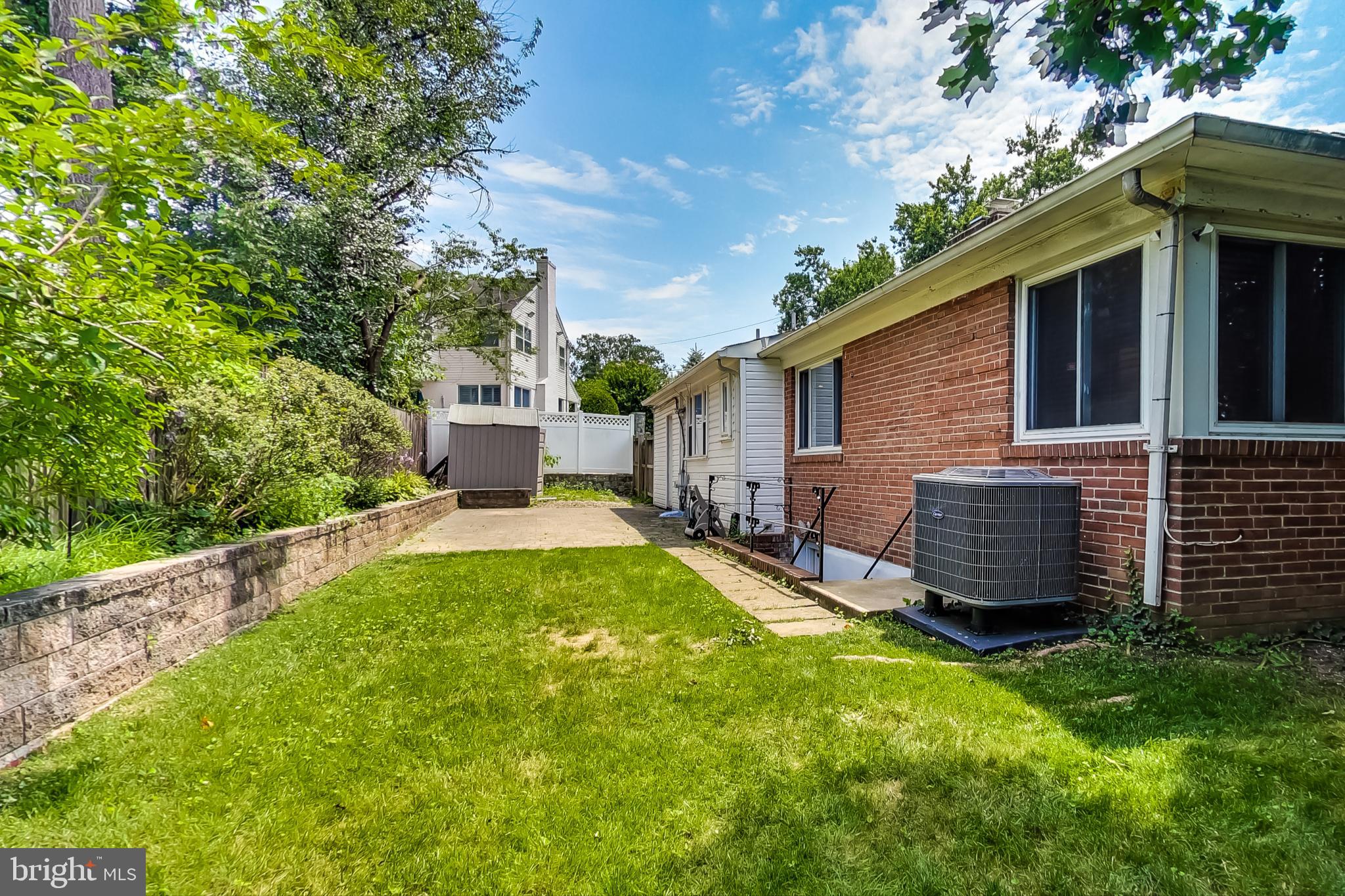 8617 Lynbrook Drive Bethesda, MD 20814 - Photo 45 of 48 a view of a backyard with a garden