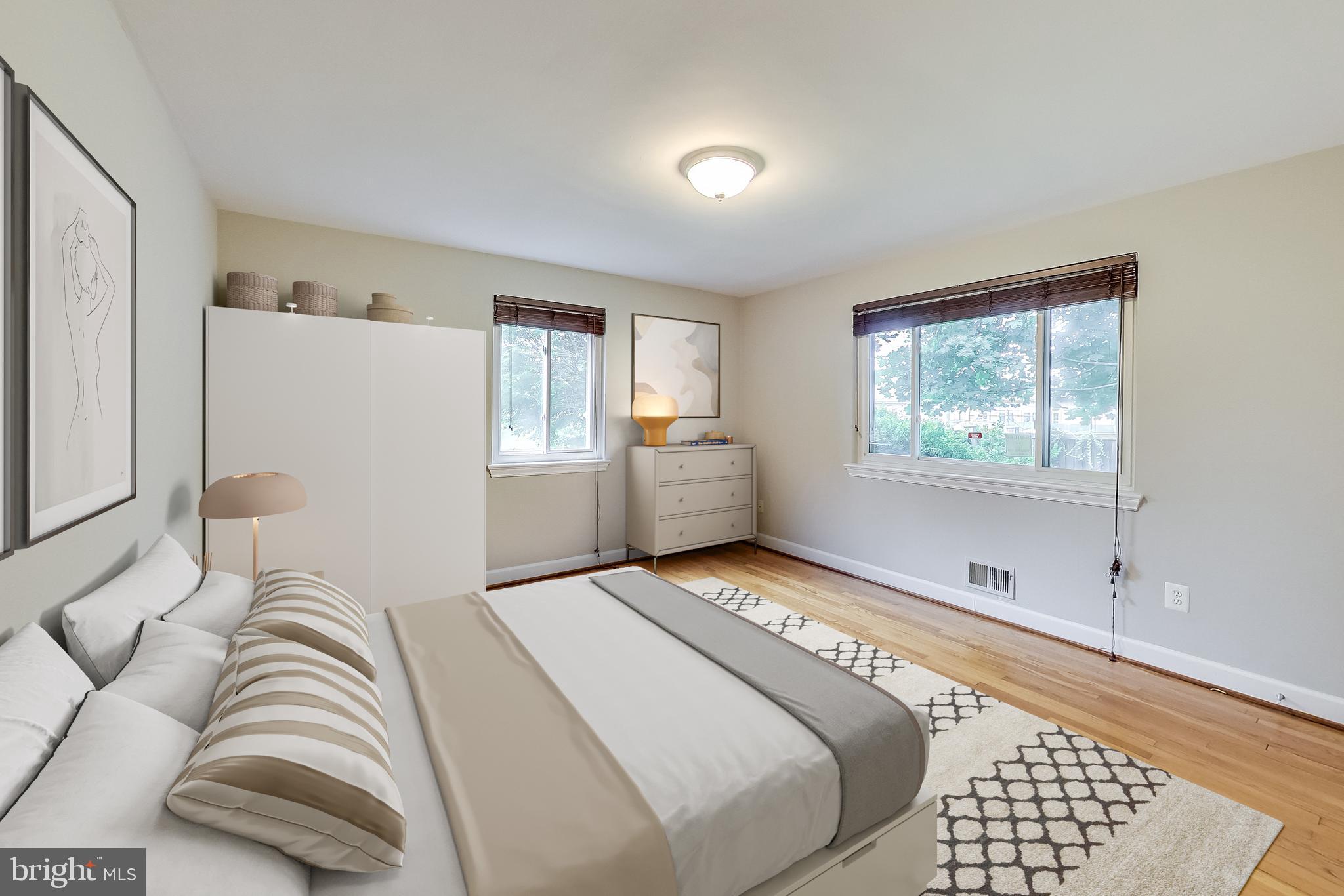 8617 Lynbrook Drive Bethesda, MD 20814 - Photo 6 of 48 a bedroom with a bed and a window