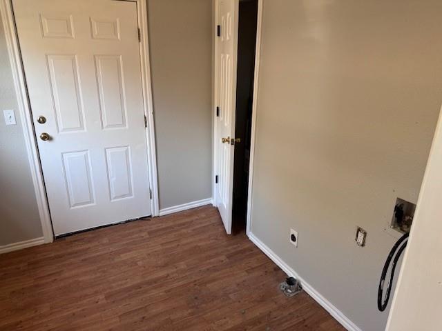 834 Graham Street Paris, TX 75460 - Photo 6 of 8 a view of an empty room with wooden floor