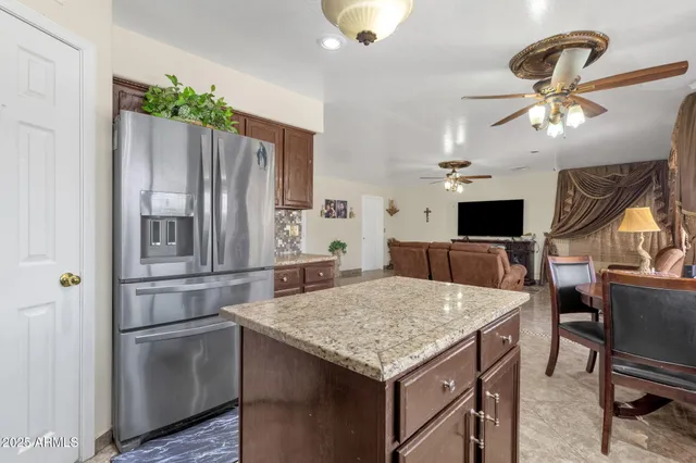 a kitchen with a sink stove and microwave