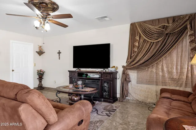 a kitchen with kitchen island a counter top space appliances and cabinets