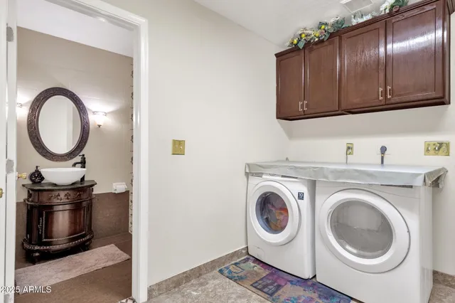 a bathroom with a sink a toilet a shower and a mirror