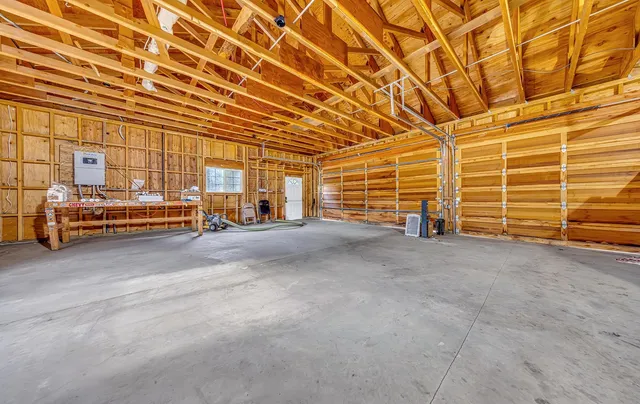 a view of a parking space with garage