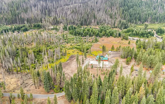 a view of a lake with a yard