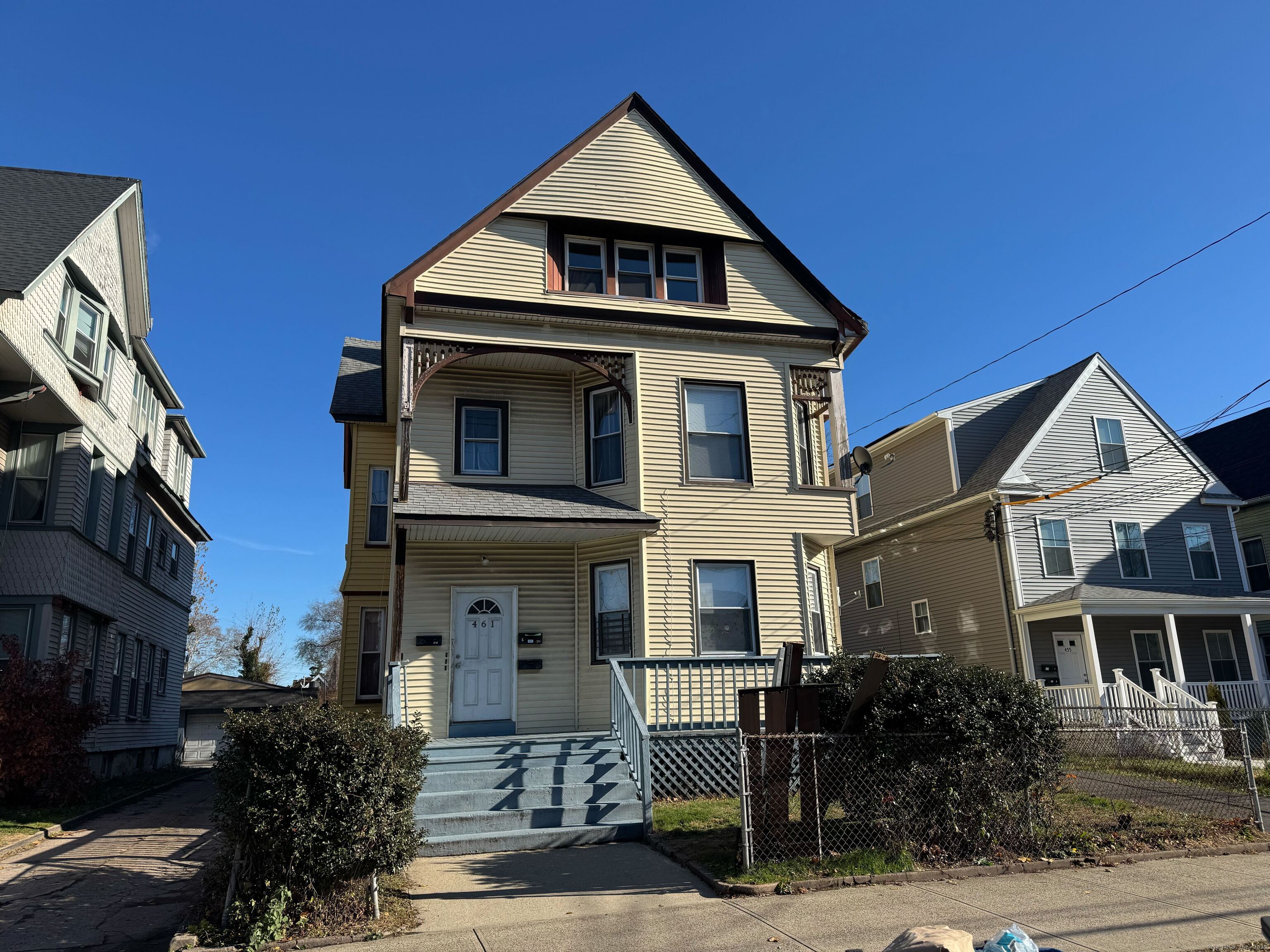 461 Howard Avenue, Unit 3 New Haven, CT 06519 - Photo 1 of 11 a view of a house with a small yard