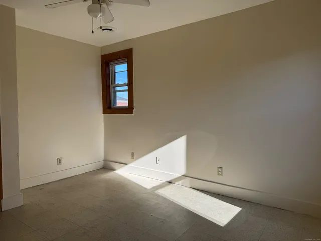 an empty room with a window