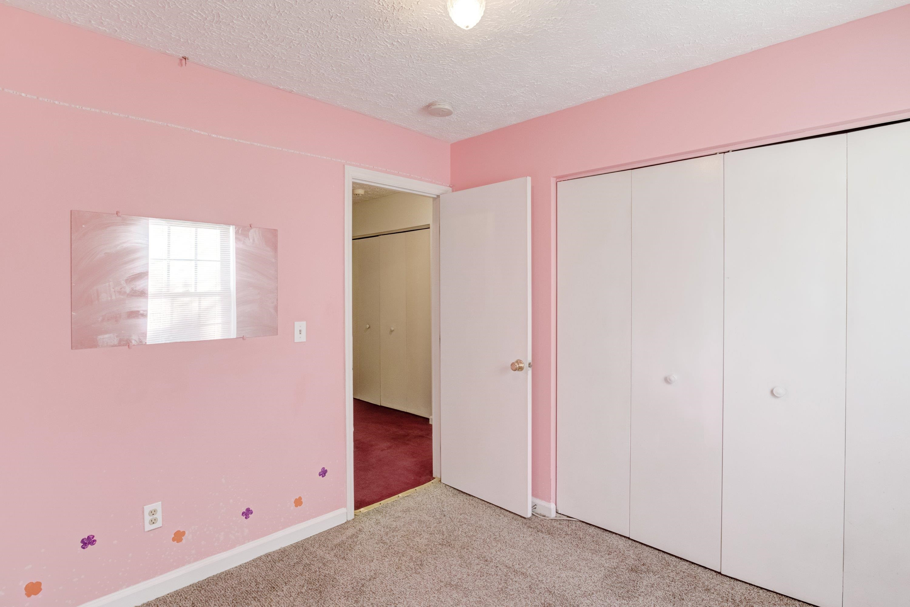 5823 Hadrian Drive Durham, NC 27703 - Photo 12 of 20 a view of an empty room