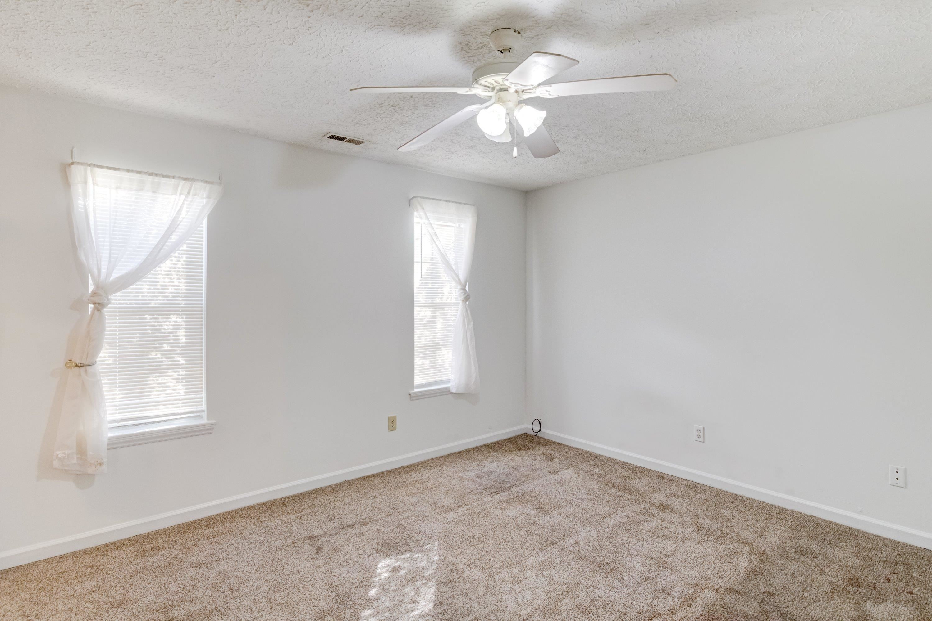 5823 Hadrian Drive Durham, NC 27703 - Photo 14 of 20 an empty room with a window