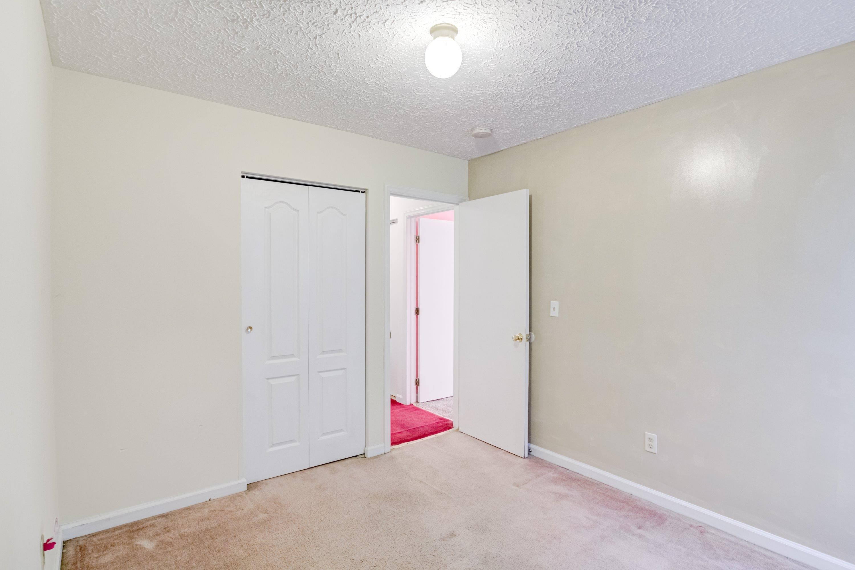 5823 Hadrian Drive Durham, NC 27703 - Photo 10 of 20 a view of an empty room