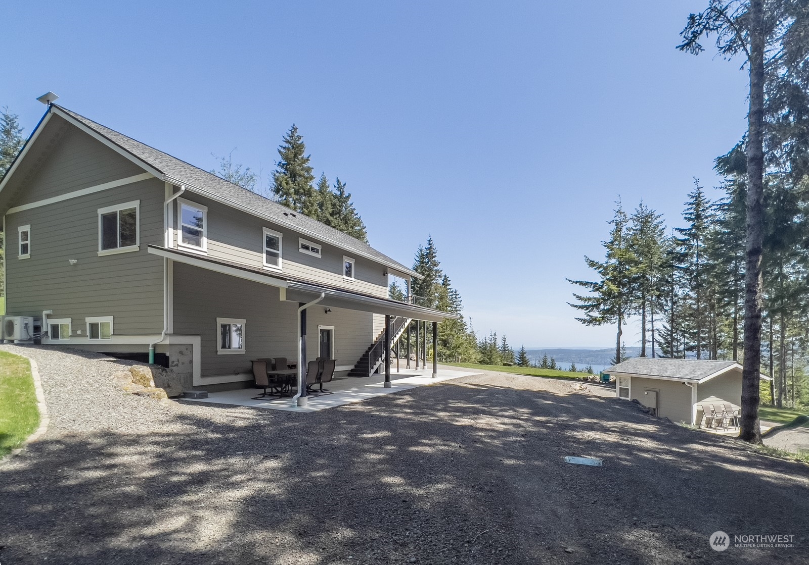 685 Misty Ridge Road Port Townsend, WA 98368 - Photo 14 of 39 a view of a house with a yard and sitting area