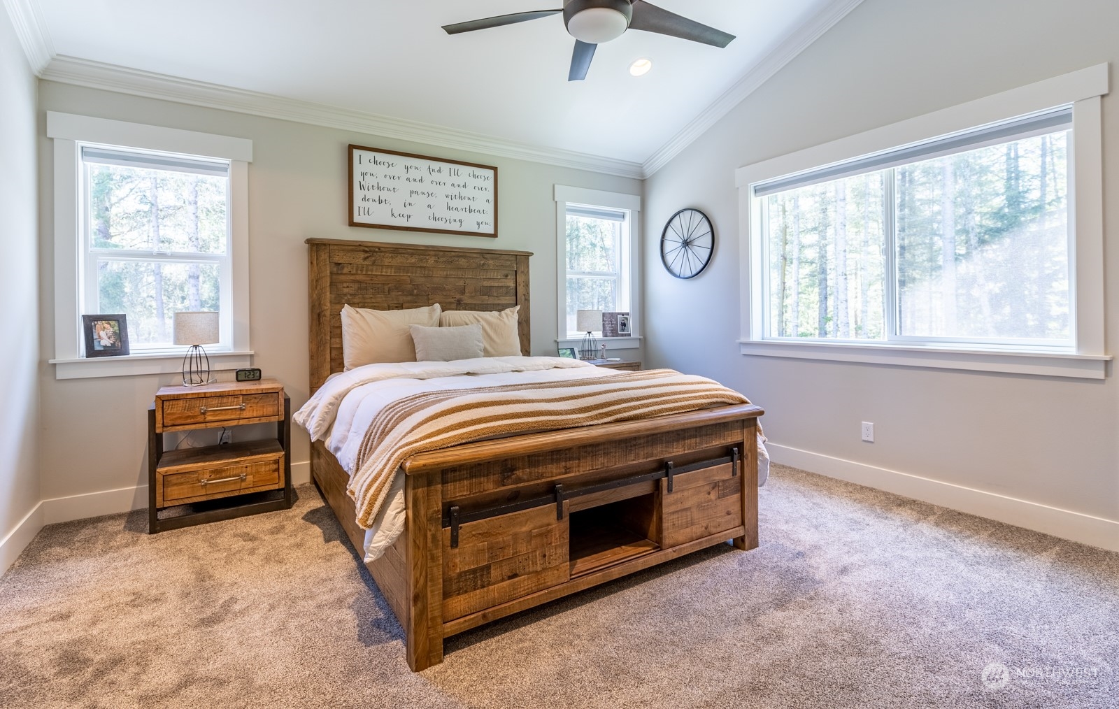 685 Misty Ridge Road Port Townsend, WA 98368 - Photo 26 of 39 a bedroom with a bed and a window