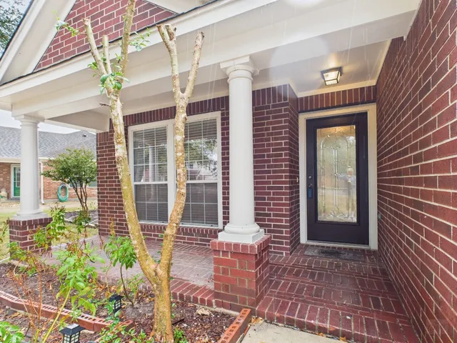 a front view of a house with a porch
