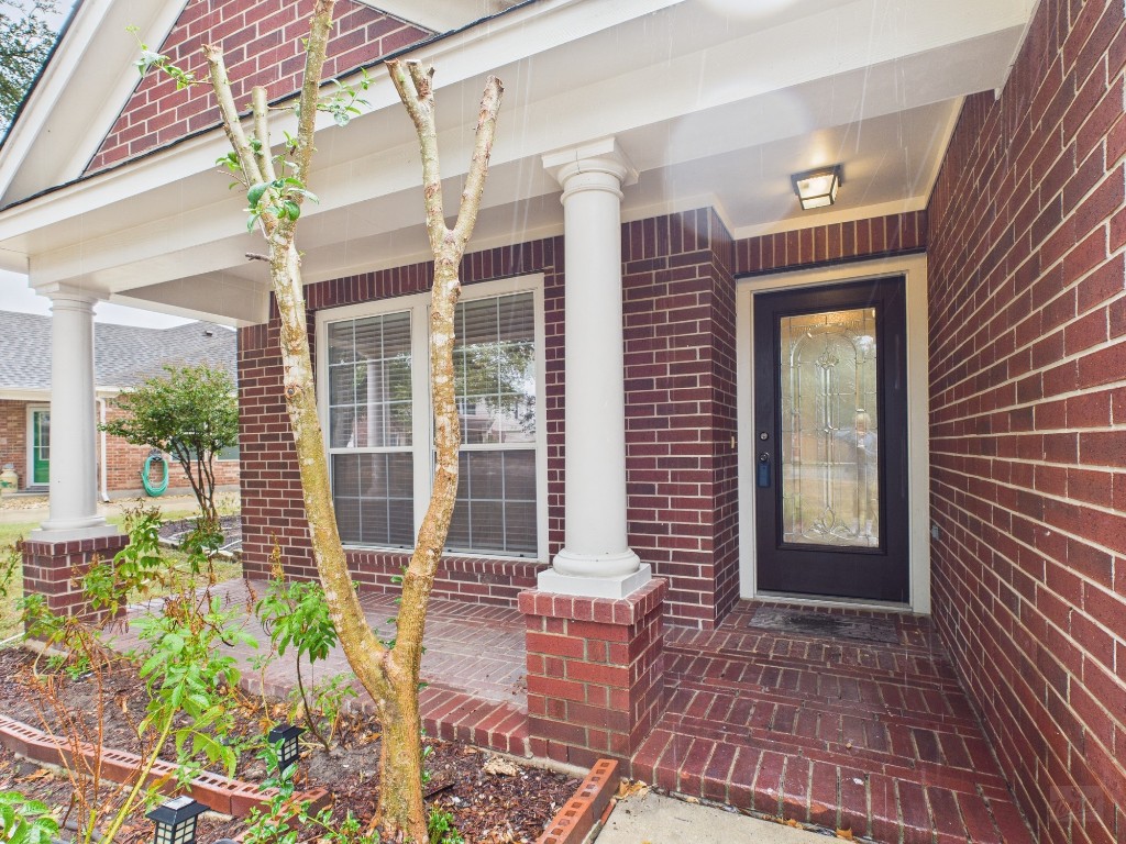 136 Winter Street Kyle, TX 78640 - Photo 2 of 32 a front view of a house with a porch