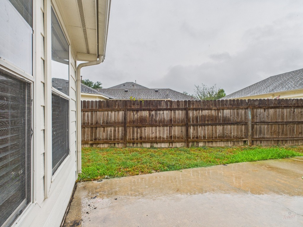 136 Winter Street Kyle, TX 78640 - Photo 25 of 32 a view of a garden with a small cabin
