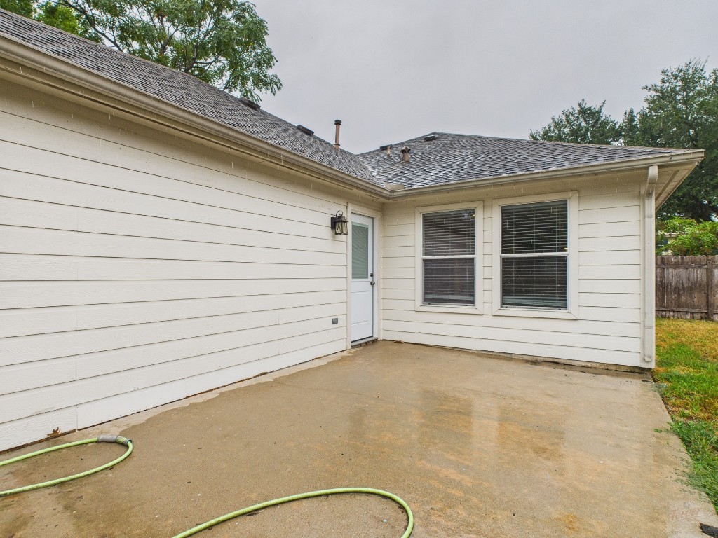 136 Winter Street Kyle, TX 78640 - Photo 30 of 32 a view of a house with a garage