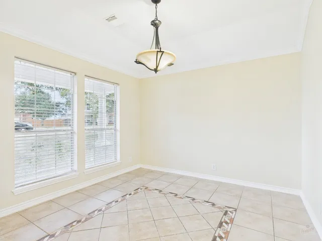 a view of a room with a large window