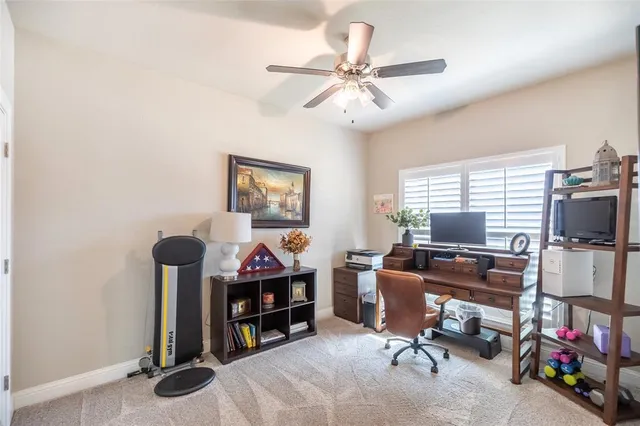 a view of a livingroom with furniture and front door