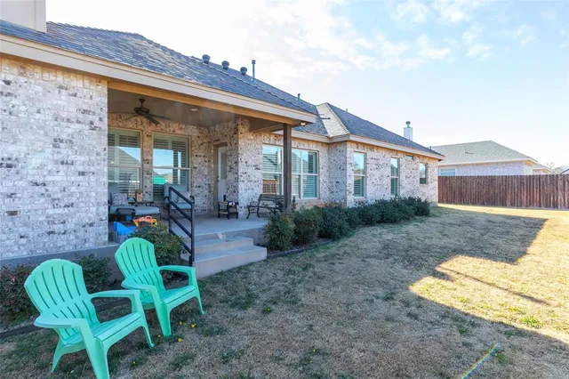 a view of a swimming pool with an outdoor space